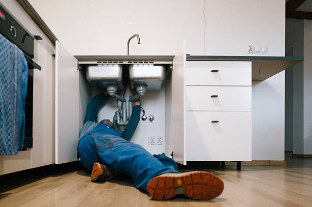 Professional Drain Cleaning technician working in Lancing, TN